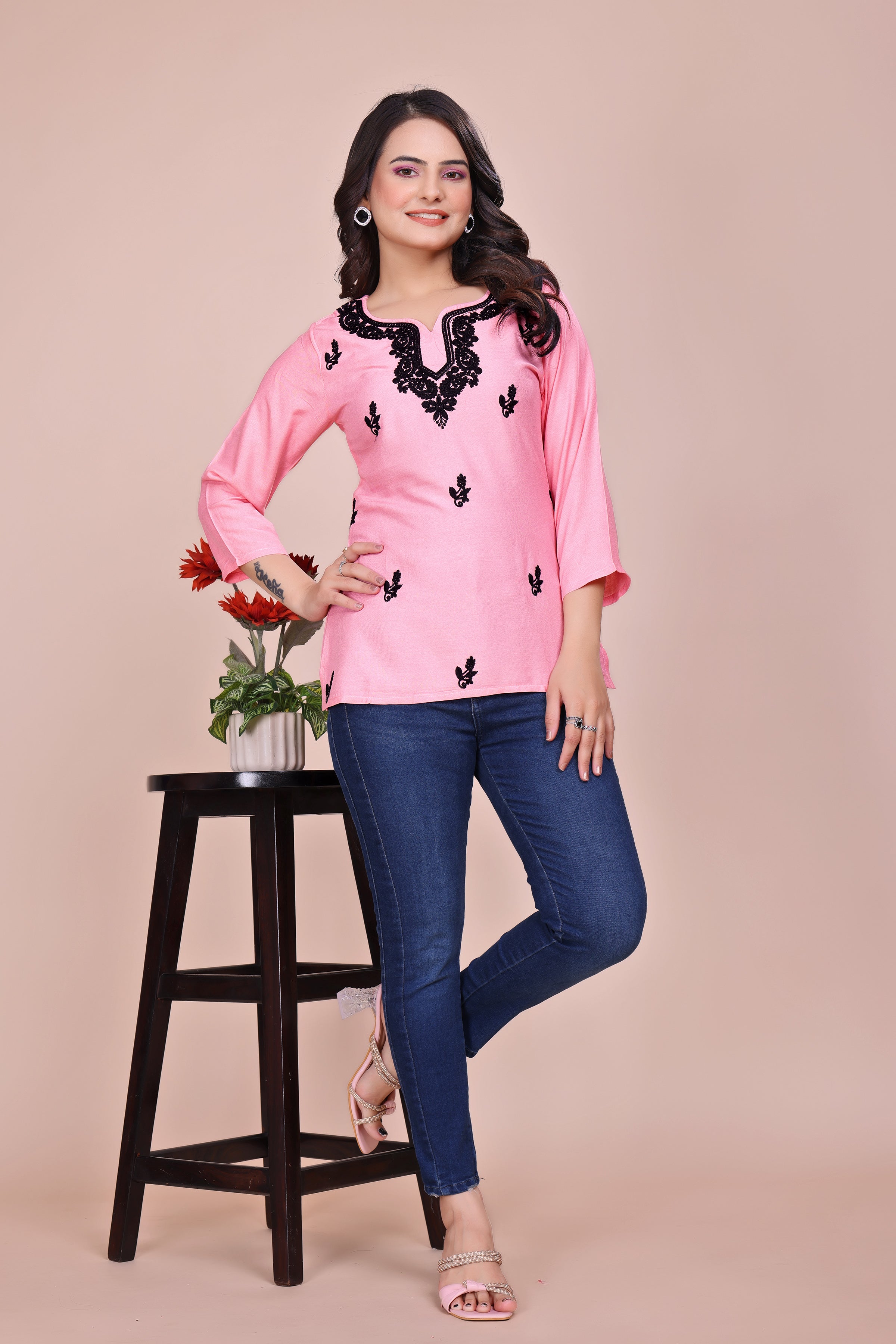 Pink and black embroidered tunic