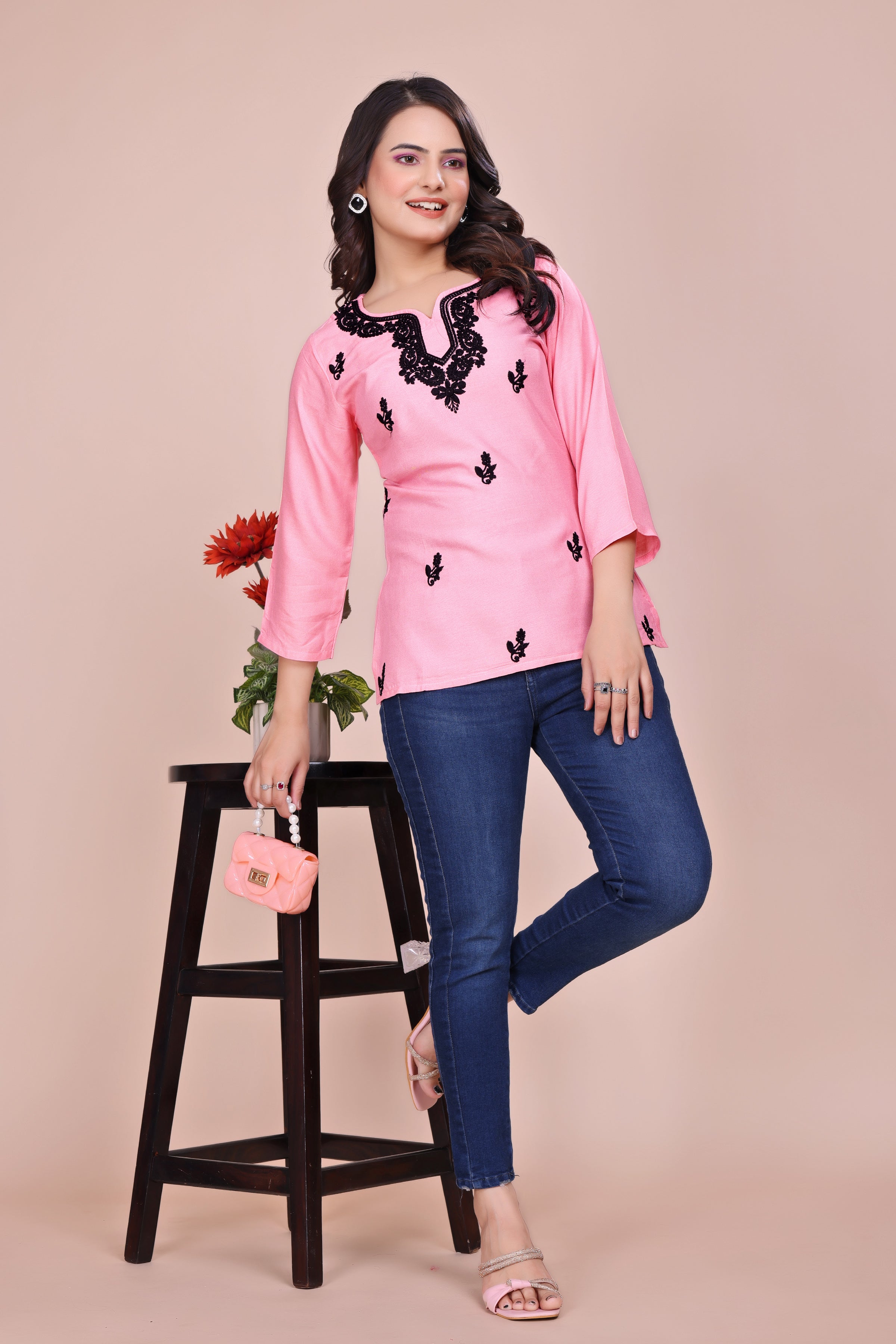 Pink and black embroidered tunic