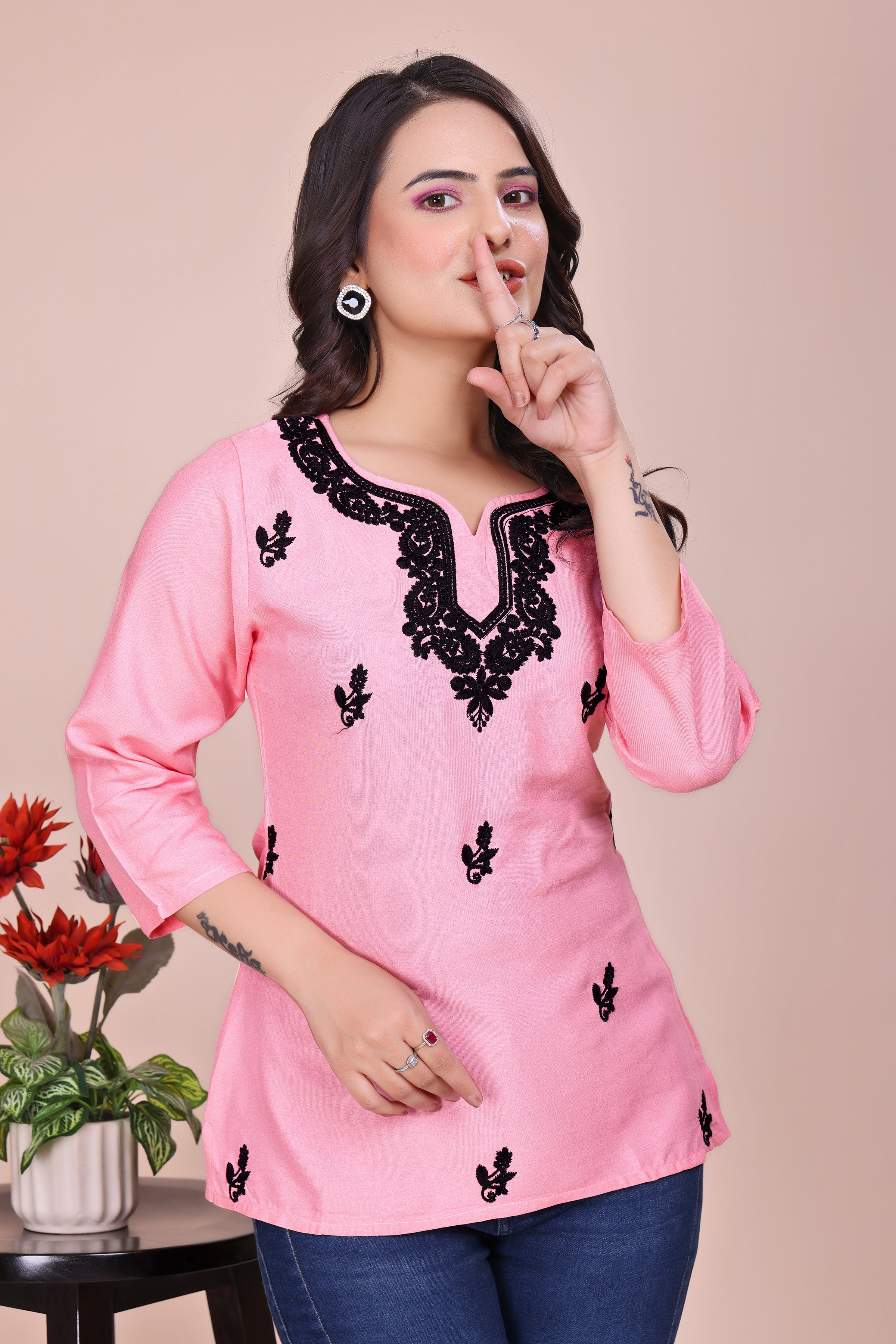 Pink and black embroidered tunic