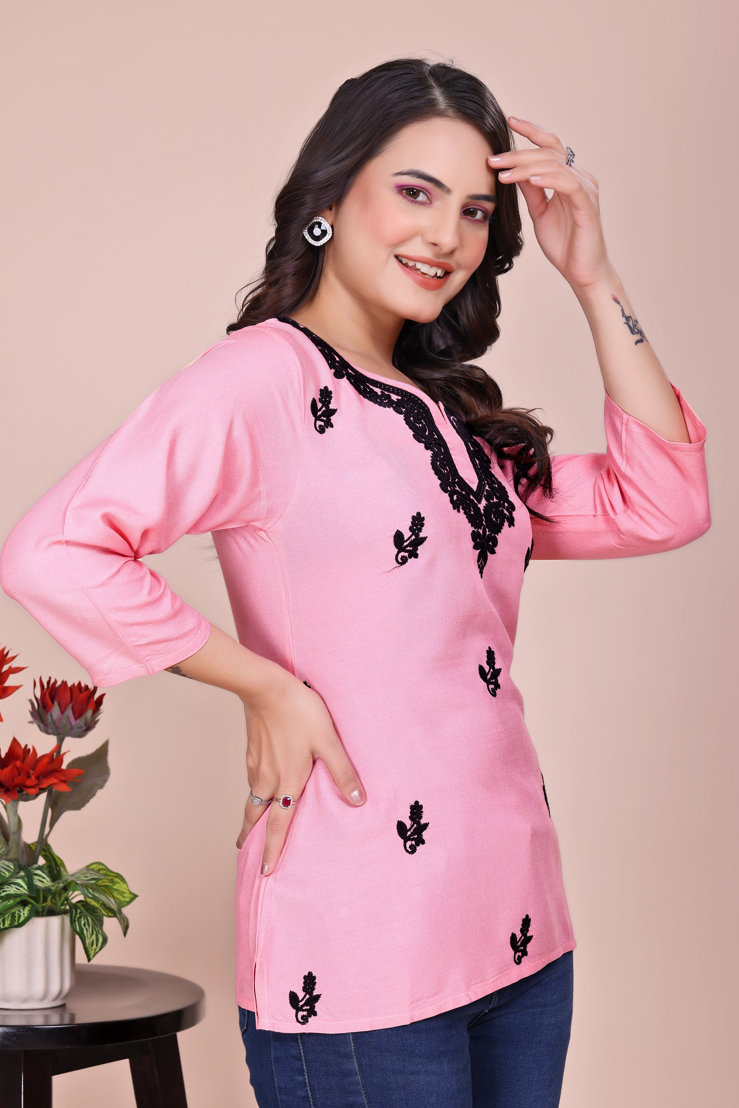 Pink and black embroidered tunic