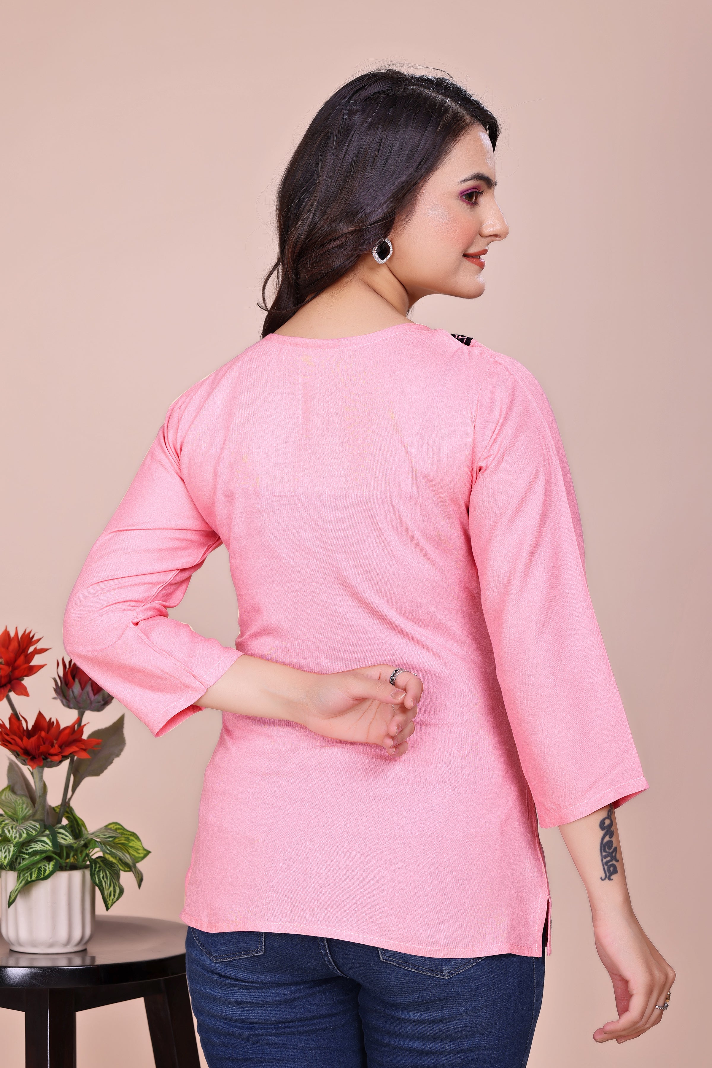 Pink and black embroidered tunic