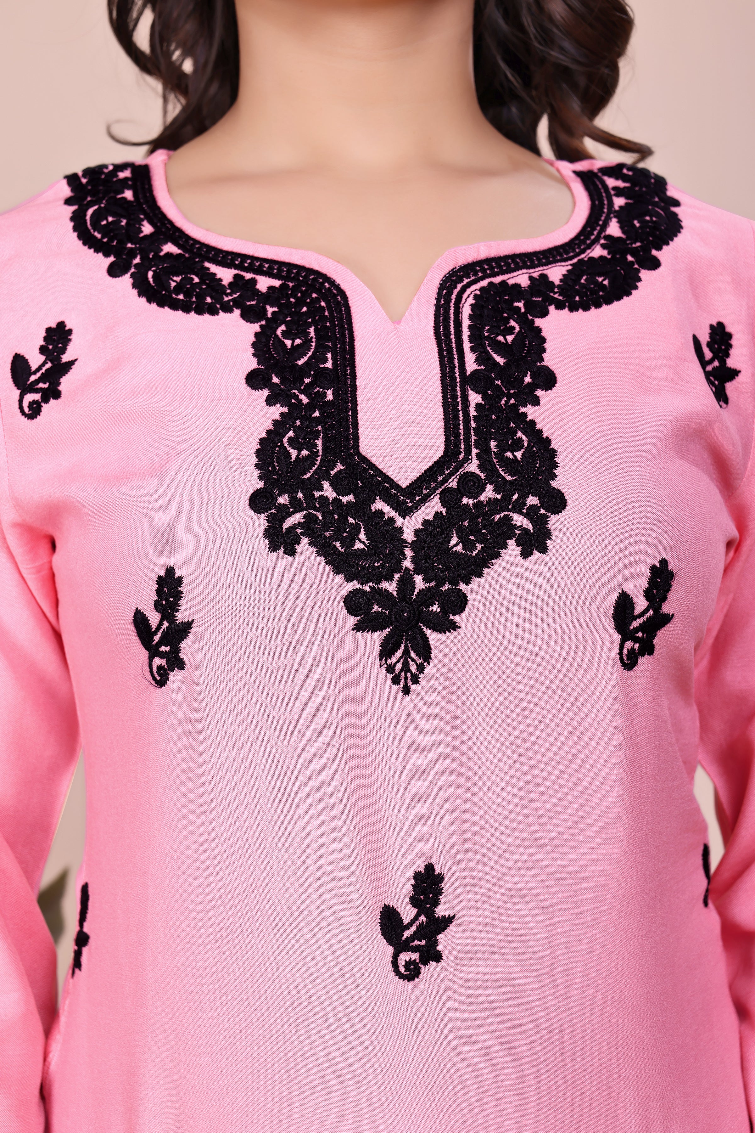 Pink and black embroidered tunic